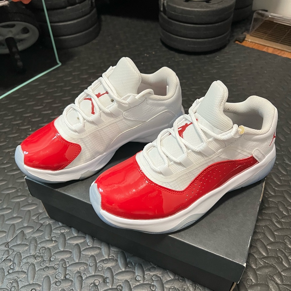 Jordan 11 CMFT Low GS in White and Red-Black